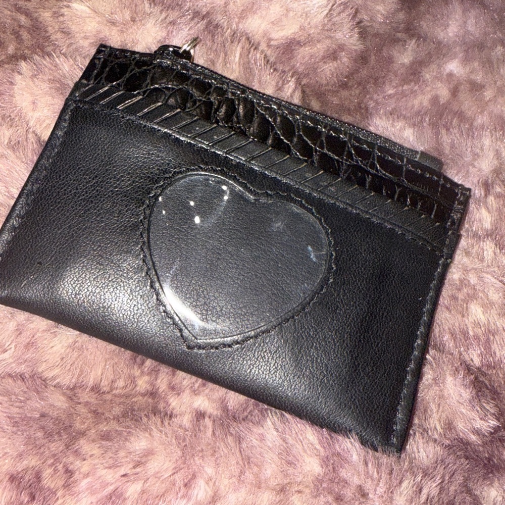 Vintage Brighton black leather coin purse. Excellent condition.